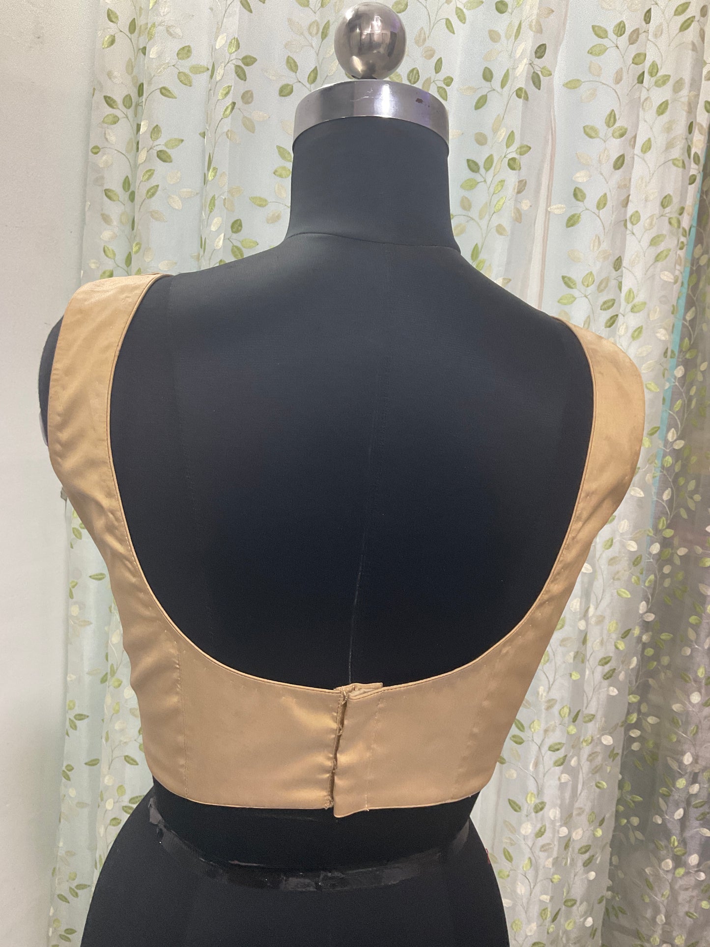 Golden sleeveless blouse
