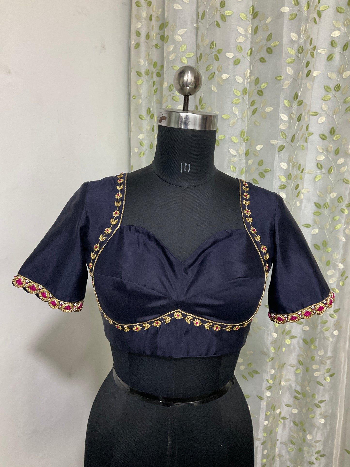 Black silk blouse with intricate embroidery