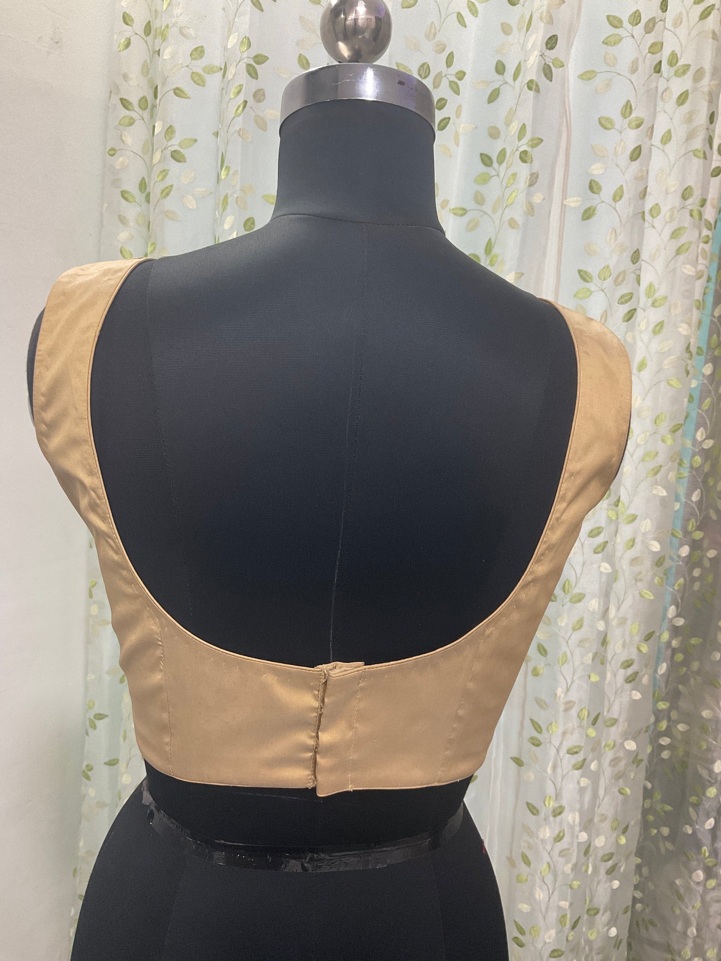 Golden sleeveless blouse