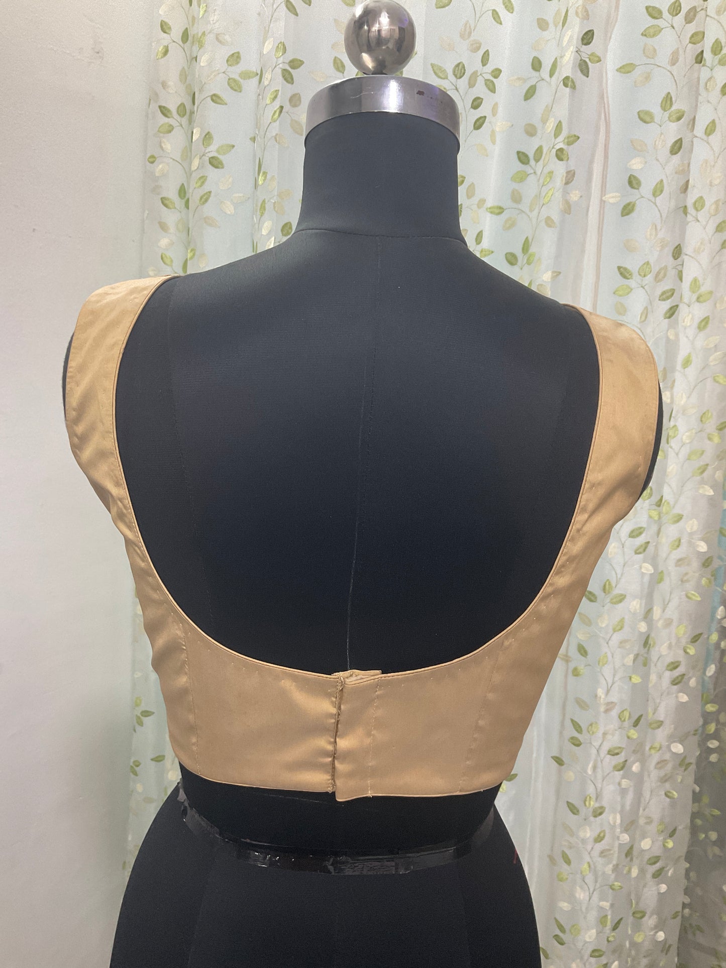 Golden sleeveless blouse