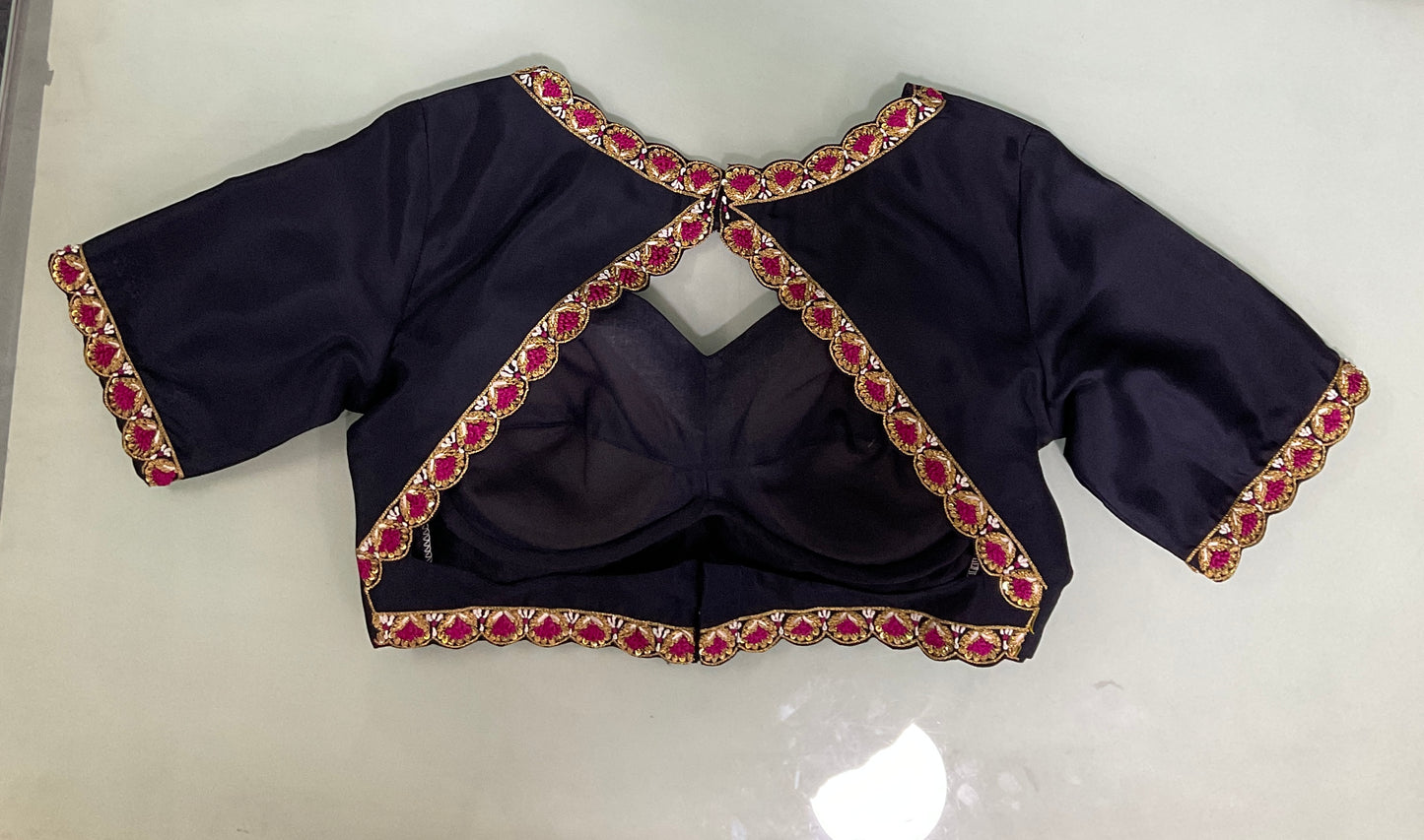 Black silk blouse with intricate embroidery